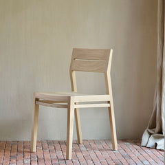 Ethnicraft Oak Ex 1 Chair 50657 in Room with Brick Floor