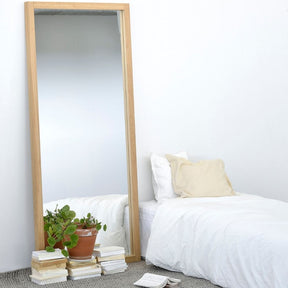 Ethnicraft Oak Light Frame Mirror in minimalist white bedroom