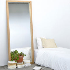 Ethnicraft Oak Light Frame Mirror in minimalist white bedroom