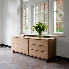 Ethnicraft Oak Wave Sideboard in Room with Flowers