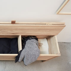 Form and Refine Oak Storage Bench with blankets