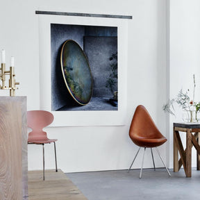Fritz Hansen Arne Jacobsen Drop Chair in Elegance Walnut Leather in room with Pink Ant Chair