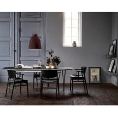 Fritz Hansen Caravaggio Pendant Light with Super Elliptical Table and Nendo N01 Chairs