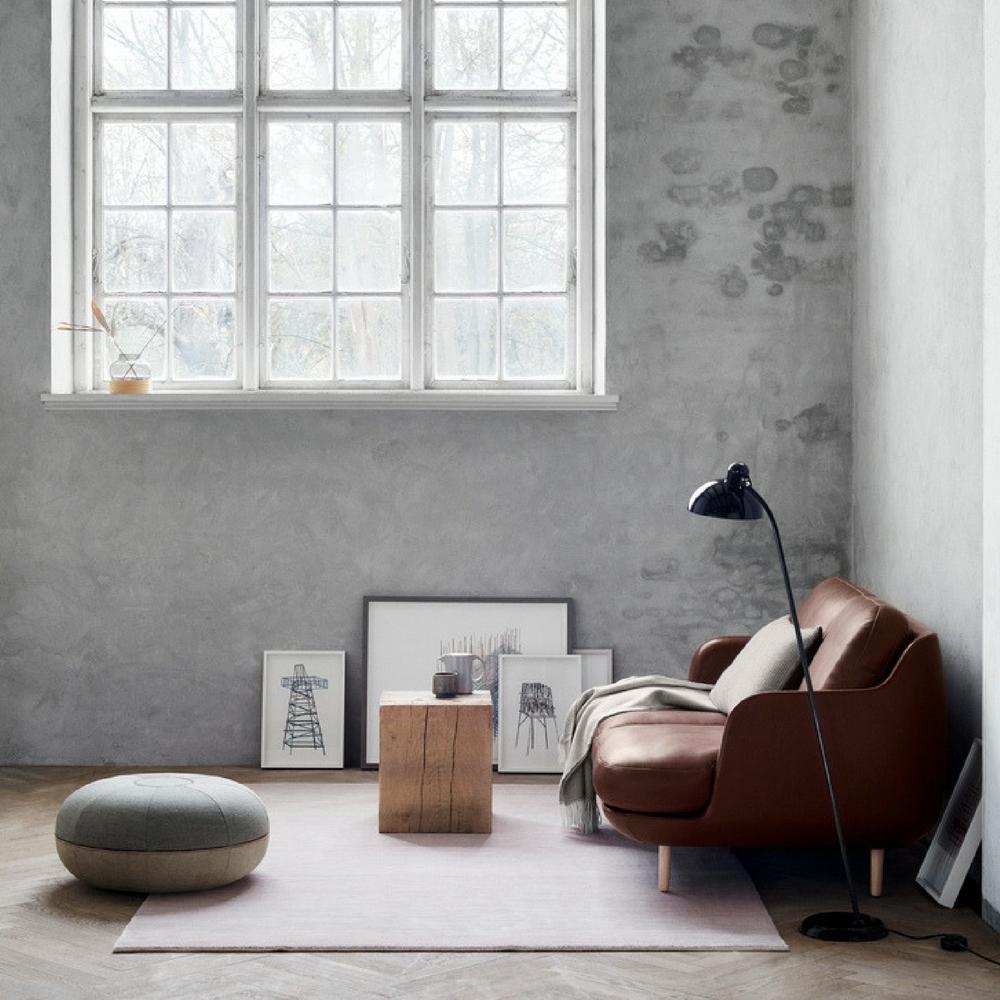 Fritz Hansen Cecilie Manz Pouf in room with Leather Lune Sofa