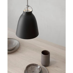Fritz Hansen Caravaggio Pendant Light by Cecilie Manz in Archipelago stone styled with earthenware