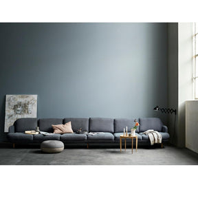 Fritz Hansen Cecilie Manz Pouf in room with Large Lune Sofa and Tray Table