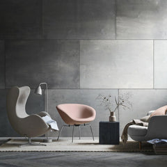 Fritz Hansen Arne Jacobsen Egg and Pot Chairs in room with Lune Sofa