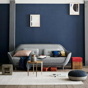 Fritz Hansen Favn Sofa by Jaime Hayon in room with Cecile Manz Pouf