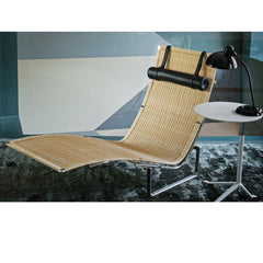 Fritz Hansen Little Friend Table in room with Poul Kjaerholm PK24 Chair