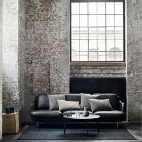 Fritz Hansen Join Coffee Table in Room with Lune Sofa in Black Leather