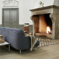 Fritz Hansen Lune Sofa by Jaime Hayon JH300 in room with Cozy Fireplace