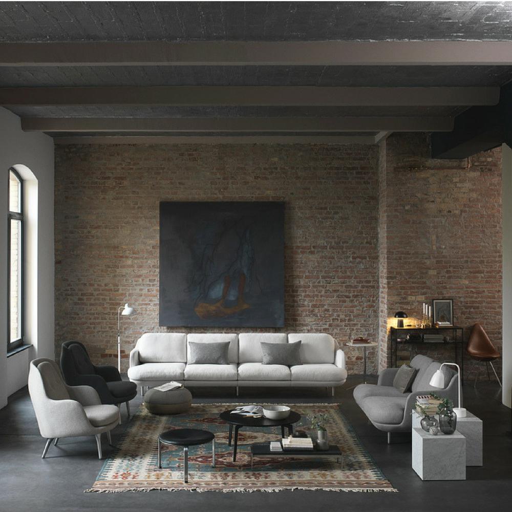 Fritz Hansen Join Coffee Table Round in Room with Lune Sofas and Fri Chairs