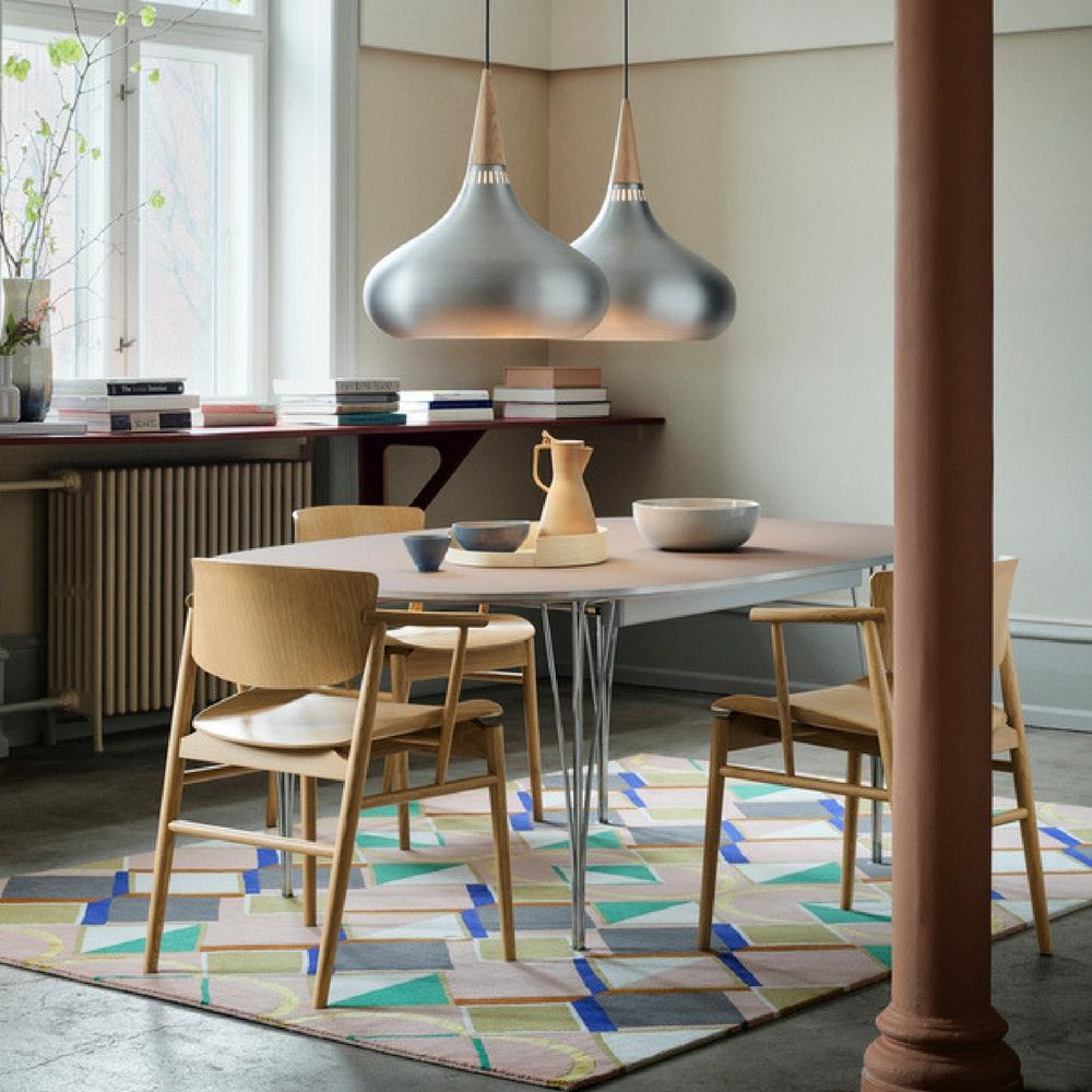 Fritz Hansen Nendo N01 Dining Chairs in room with Orient Pendant Lights and Super Elliptical Dining Table