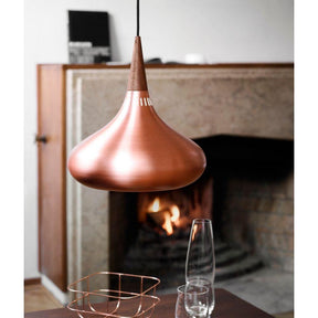 Fritz Hansen Orient Pendant Light Copper in dining room with Fireplace