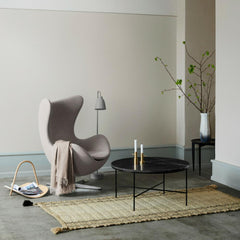 Fritz Hansen Paul McCobb Planner Coffee Table in room with Egg Chair