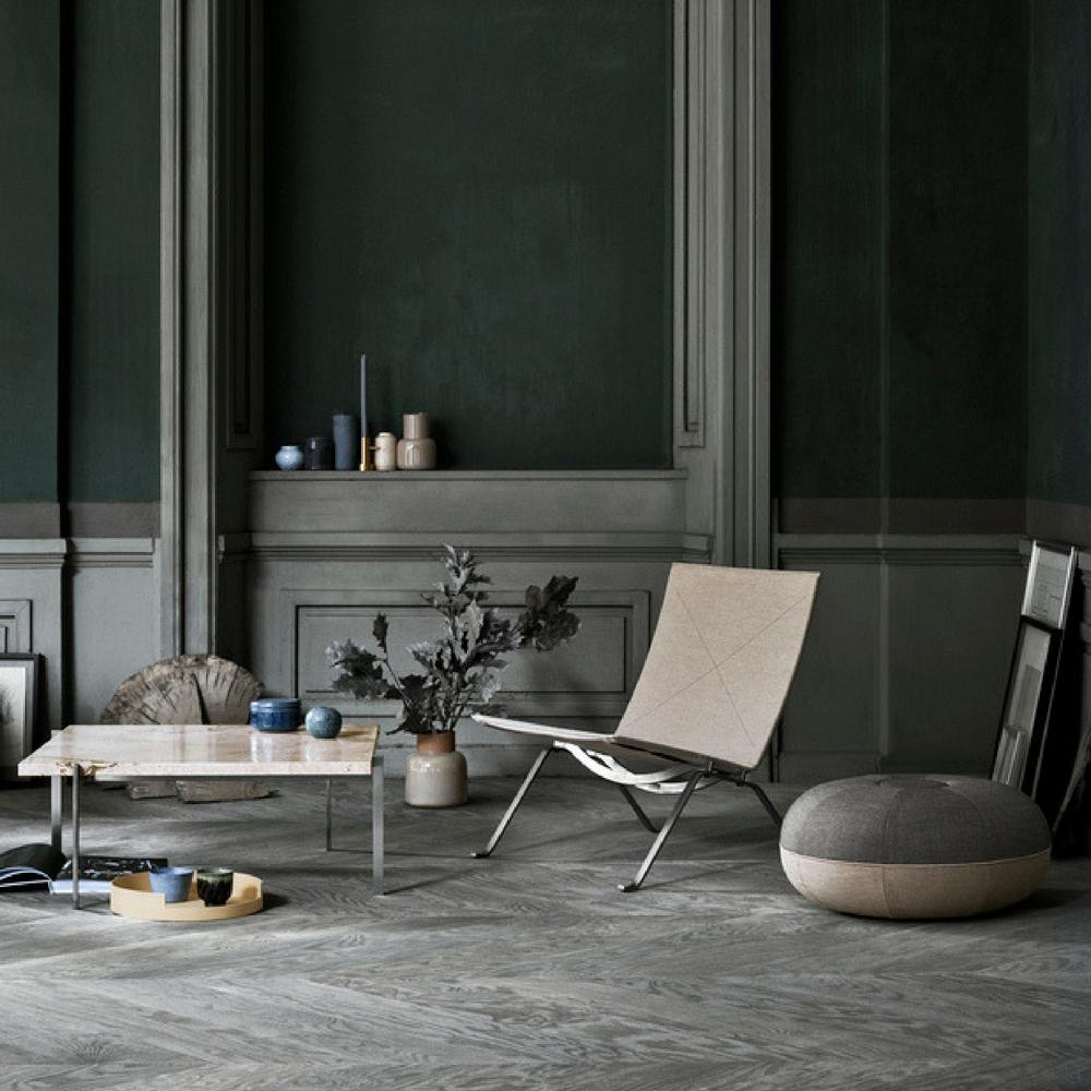 Fritz Hansen Pouf by Cecilie Manz in room with Poul Kjaerholm PK22 Chair and Coffee table