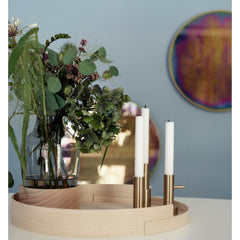 Fritz Hansen Mirror by Studio Roso styled in room with tray and candleholders