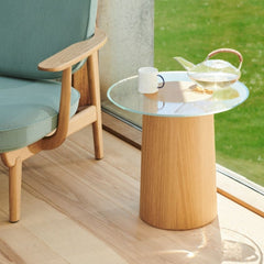 Fritz Hansen Stub Side Table by Mette Schelde in room with Fred Lounge Chair by Jaime Hayon