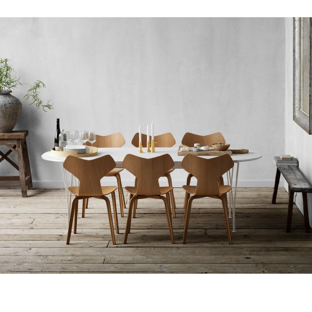 Fritz Hansen Grand Prix Chairs in Room with Super Elliptical Dining Table Arne Jacobsen