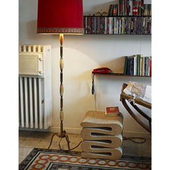 Gehry Wiggle Stool in Room with Red Lamp Vitra