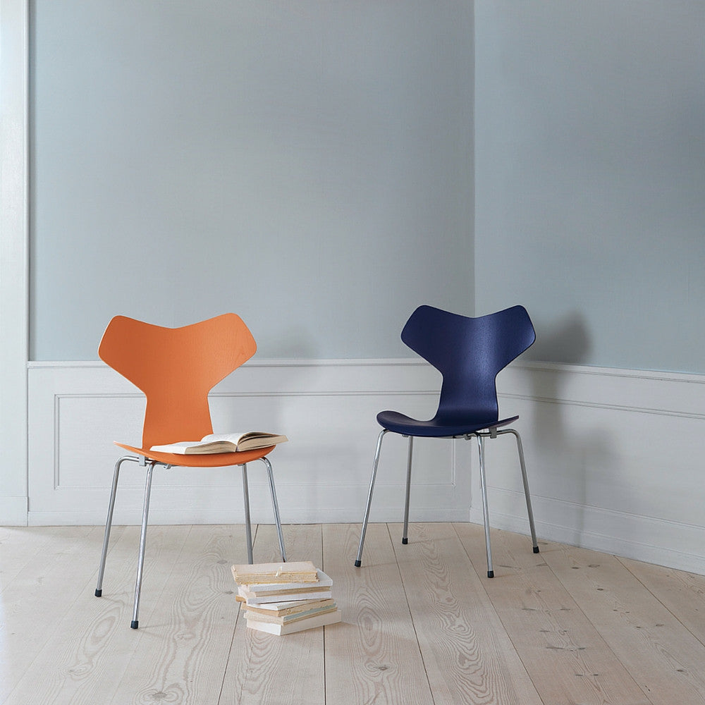 Grand Prix Chairs in Colors in Room with Books Arne Jacobsen Fritz Hansen
