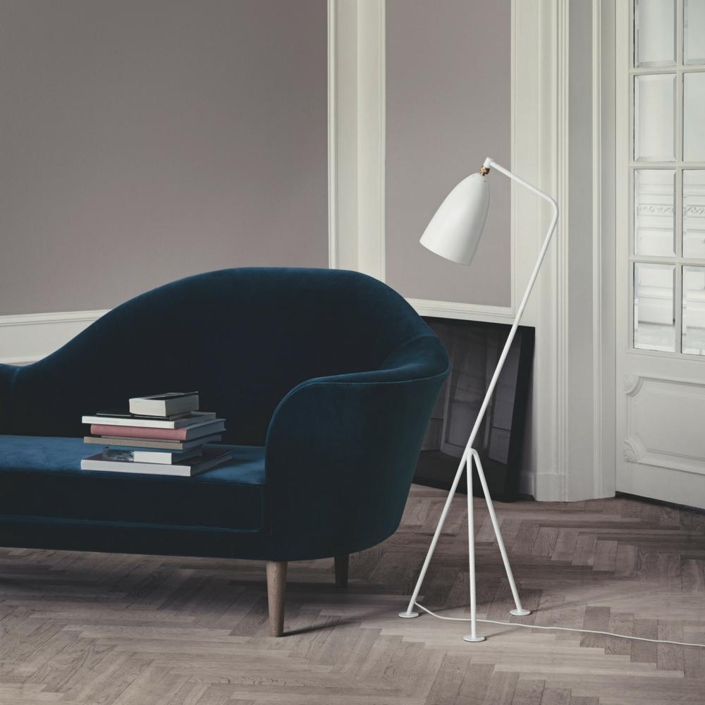 Grasshopper Floor Lamp by Greta Grossman with the Grand Piano Sofa by Gubi Olsen