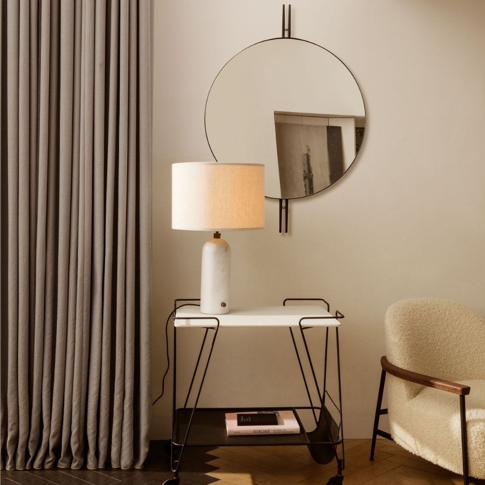 GUBI IOI Mirror by Gam Fratesi with Gravity Table Lamp, Mategot Trolley, and Sejour Lounge Chair