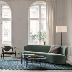GUBI Gravity Floor Lamp by Space Copenhagen in living room with Stay Sofa TS Tables and Masculo Lounge Chair