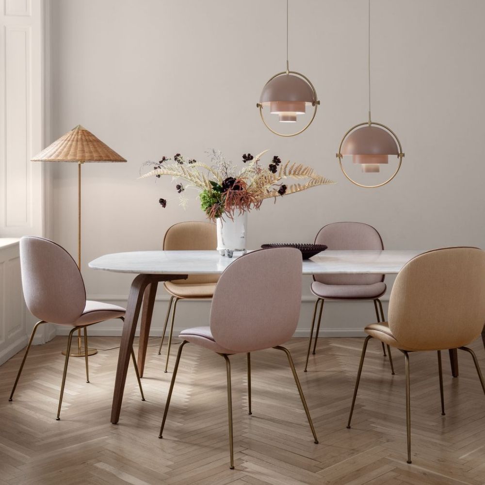 GUBI Paavo Tynell Floor Lamp in dining room with Beetle Chairs and Multilite Pendants