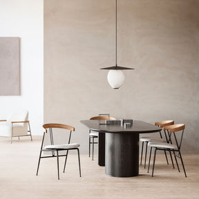 GUBI Satellite Pendant in Dining Room with Moon Ellipse Table and Violin Chairs