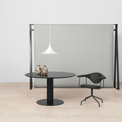 Gubi White Semi Pendant in office with black Masculo Chair
