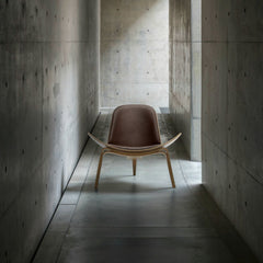 Hans Wegner Shell Chair CH07 Brown Leather Front Concrete Carl Hansen & Son