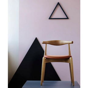 Wegner Elbow Chair in situ in pink room Carl Hansen & Son