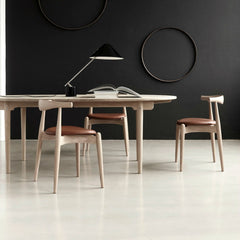 Hans Wegner CH20 Elbow Chairs in Room Carl Hansen & Son Palette & Parlor
