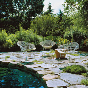Bertoia Diamond Chairs in White Rislan Outdoor Finish with Maya Lin Stone by Pool Knoll