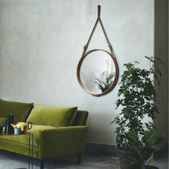 GUBI Adnet Circulaire Mirror in Tan Leather in Room