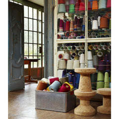 Jasper Morrison Cork Stools in Room with Colorful Spools of Yarn