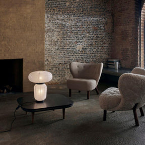 And Tradition JH18 Formakami Table Lamp by Jaime Hayon in room with Little Petra chairs and Space Copenhagen Fly Table