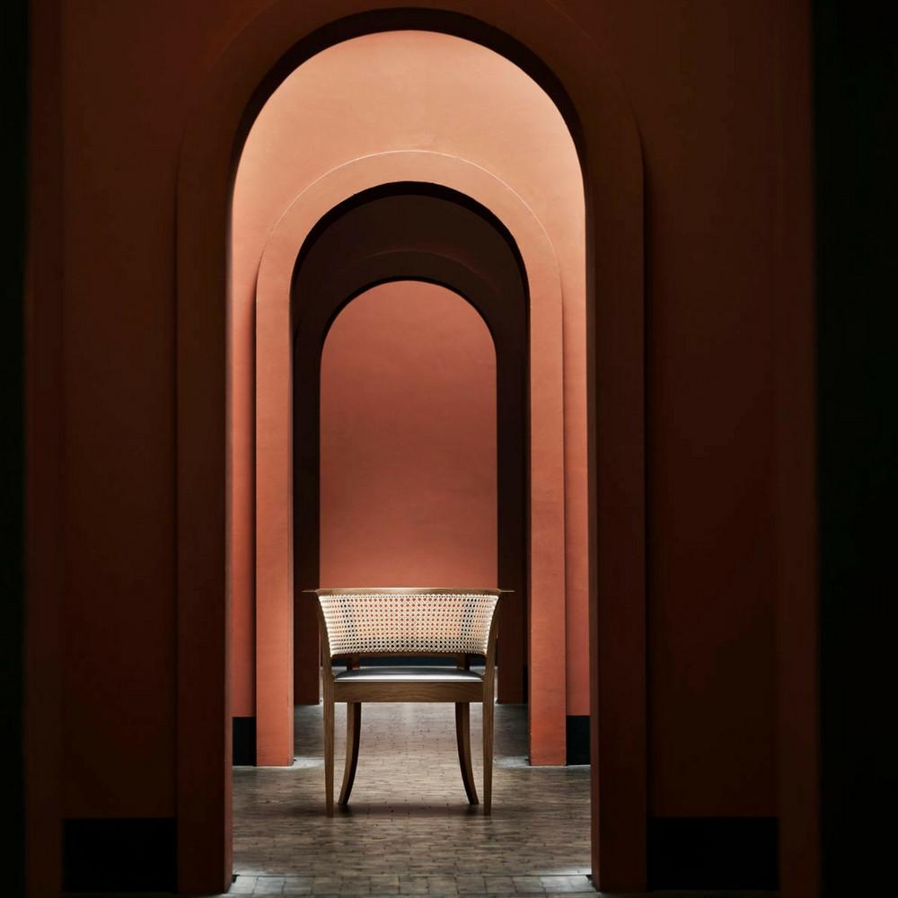 Faaborg Chair in Walnut by Kaare Klint for Carl Hansen and Son in Hallway with Arches