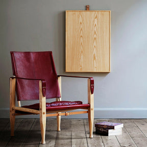 Kaare Klint Dark Red Leather Safari Chair in Room Carl Hansen and Son