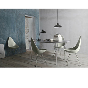 Kaiser Idell Pendant Black in room with Drop Chairs and Supercircular Table