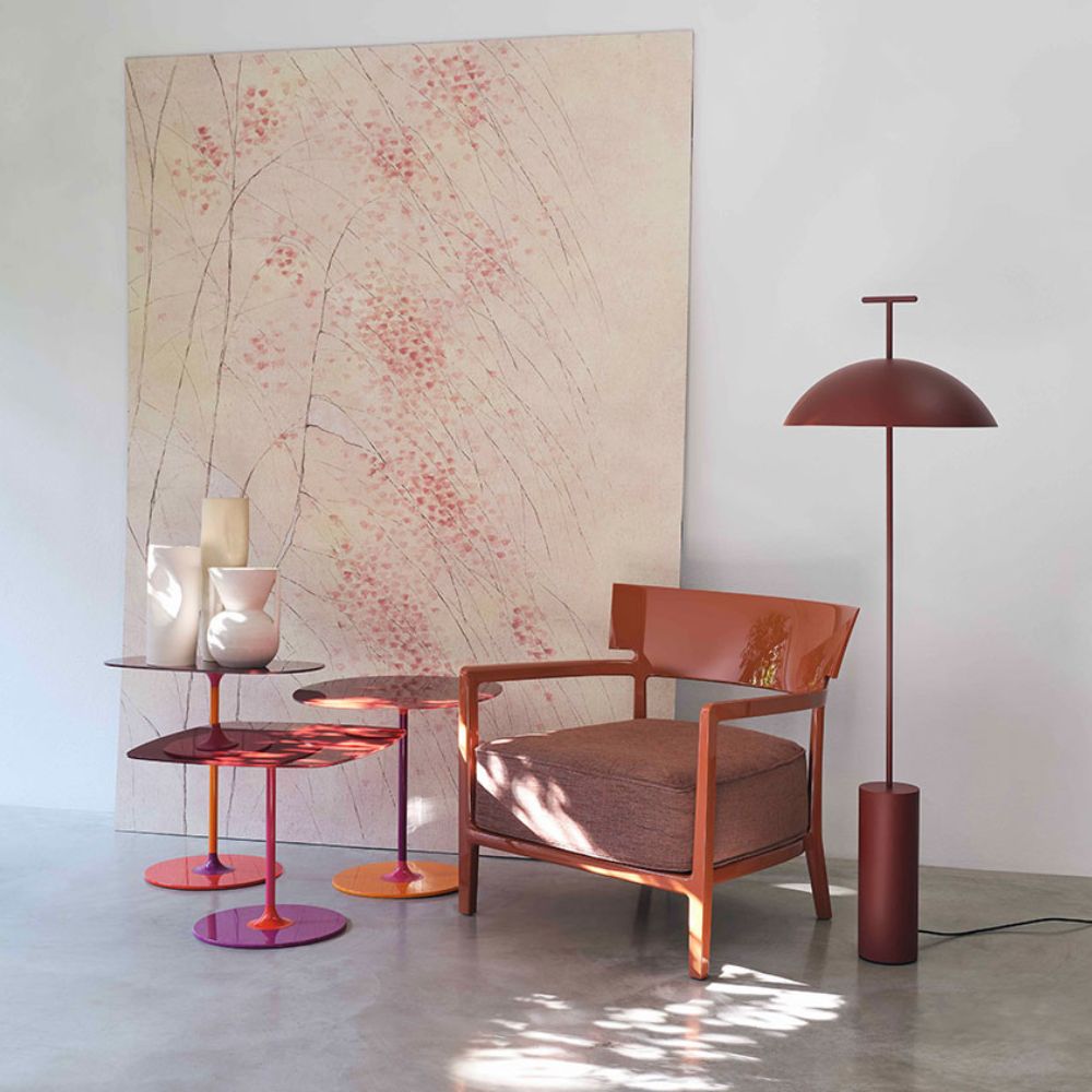 Kartell GeenA Floor Lamp by Ferruccio Laviani Brick Red in room with Thierry Side Tables and Painting