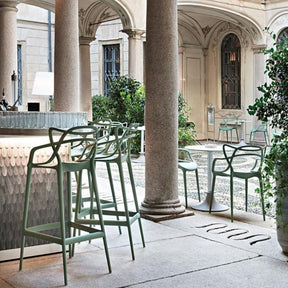 Kartell Masters Stools and Chairs in outdoor bar in Italy