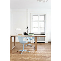 Kaiser Idell Luxus Table Lamp Gloss White in room with light blue Rin Chairs