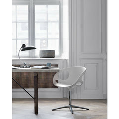 Kaiser Idell Luxus Table Lamp Matte Black in room with Rin Chair