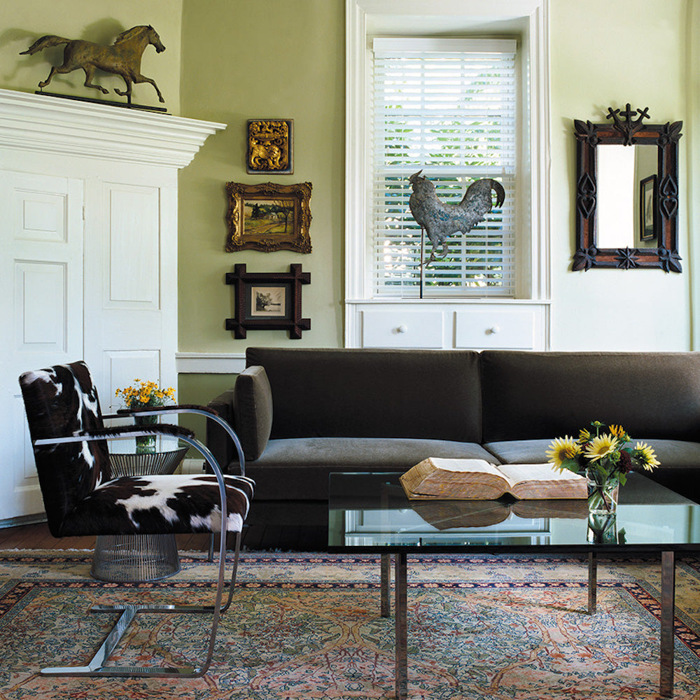 Knoll Barcelona Coffee Table in living room with Lissoni Divina Sofa and BRNO Chair