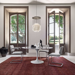 Knoll Marble Round Saarinen Dining Table in Dining Room with Cesca Chairs