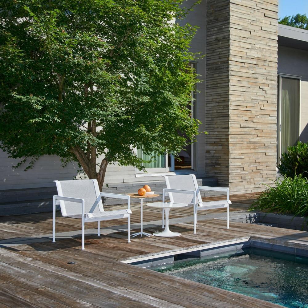 Knoll Richard Schultz Lounge Chairs by pool with Petal Table and Saarinen Outdoor Side Table