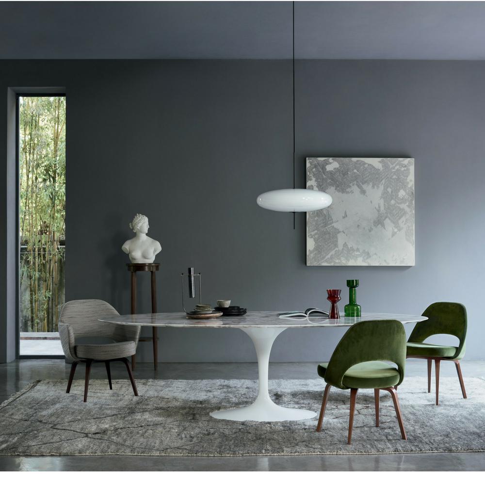 Knoll Saarinen Executive Chairs Green Velvet in room with Saarinen Oval Dining Table