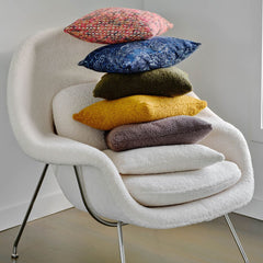 Knoll Saarinen Womb Chair in Puff Cloud Stacked with Throw Pillows